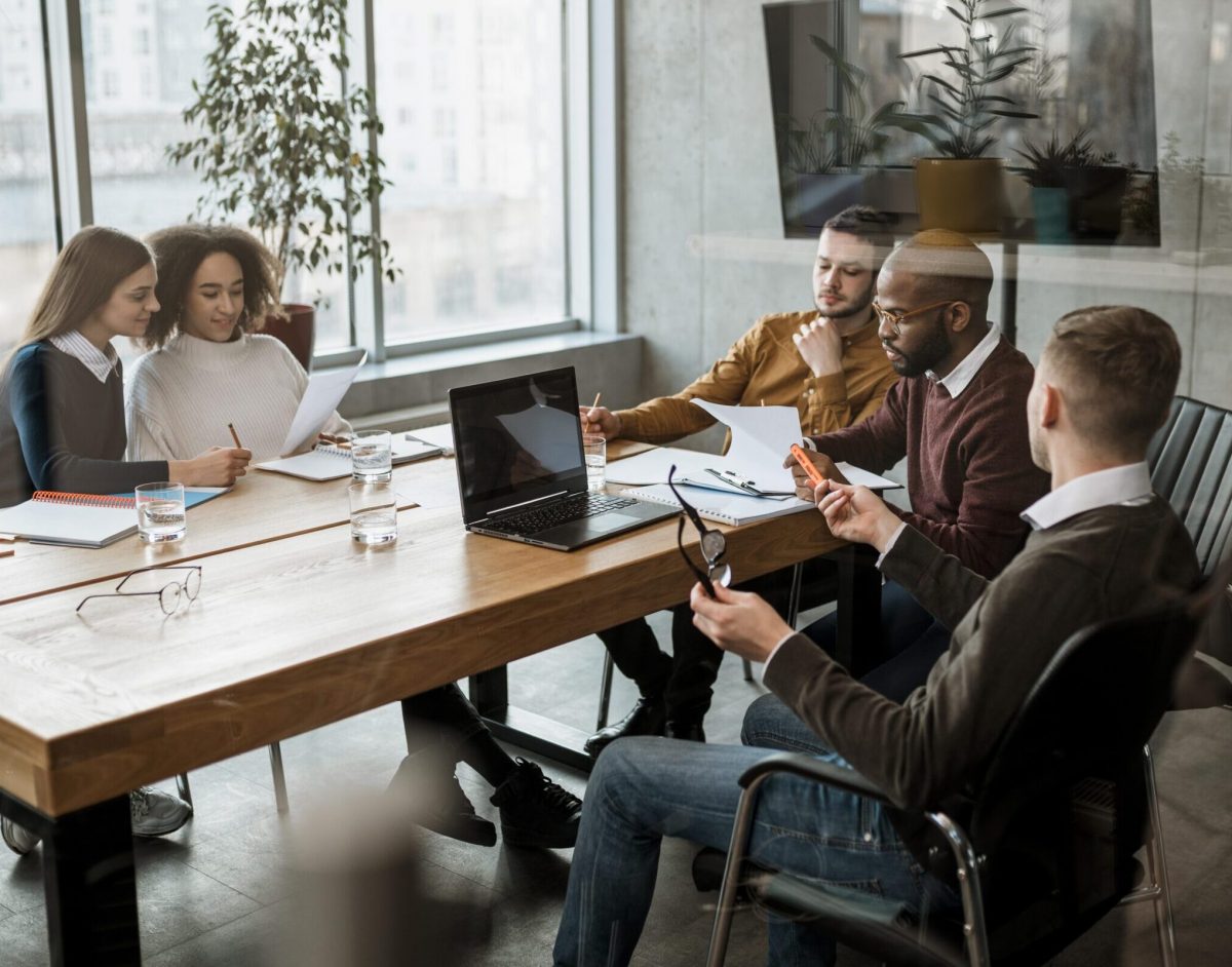 front-view-people-having-meeting-office